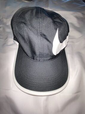 1-Nike Black and White Adjustable baseball hat. Dry fit